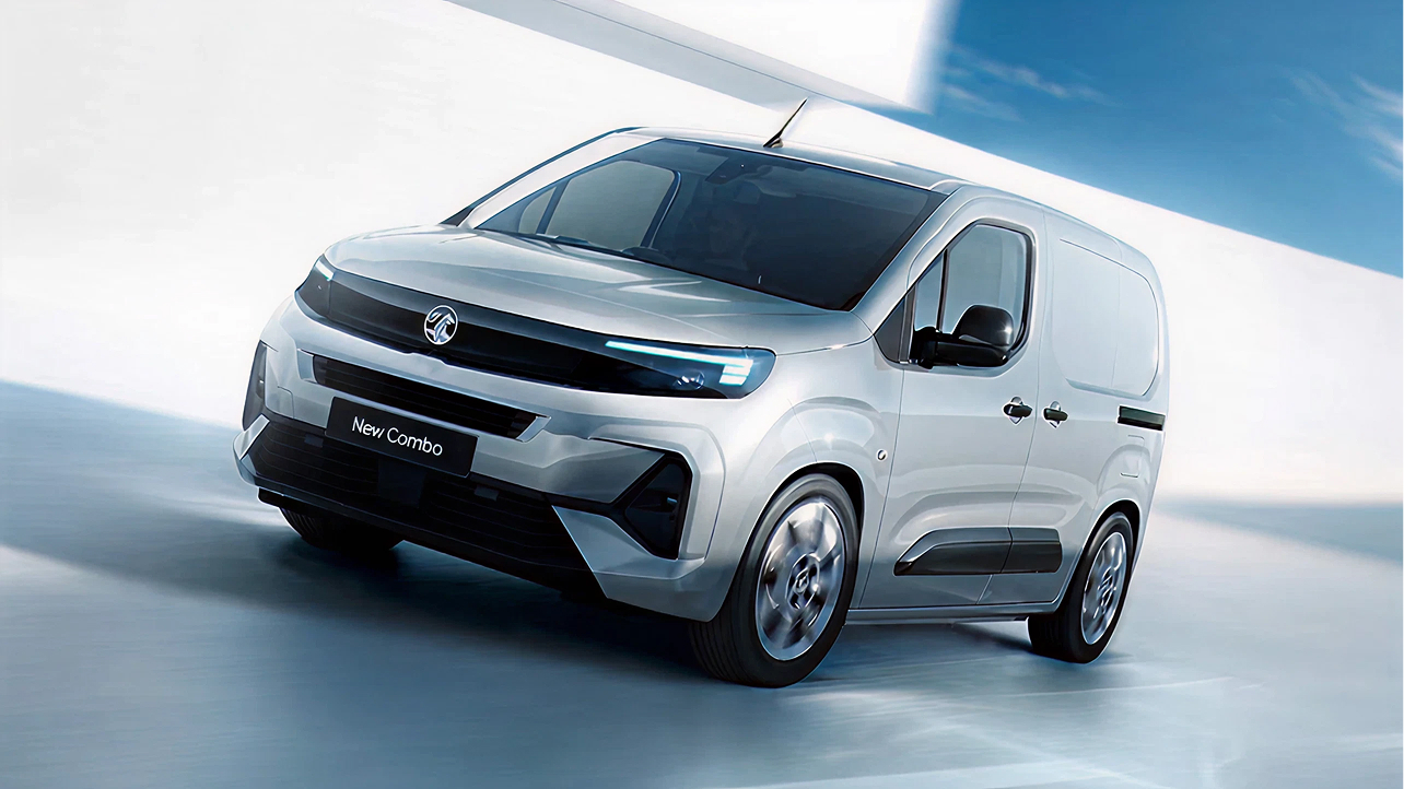 A right close up of a yellow Mercedes AMG sports car headlight on a city street